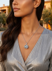 Cosmic Petal Silver Cage Necklace